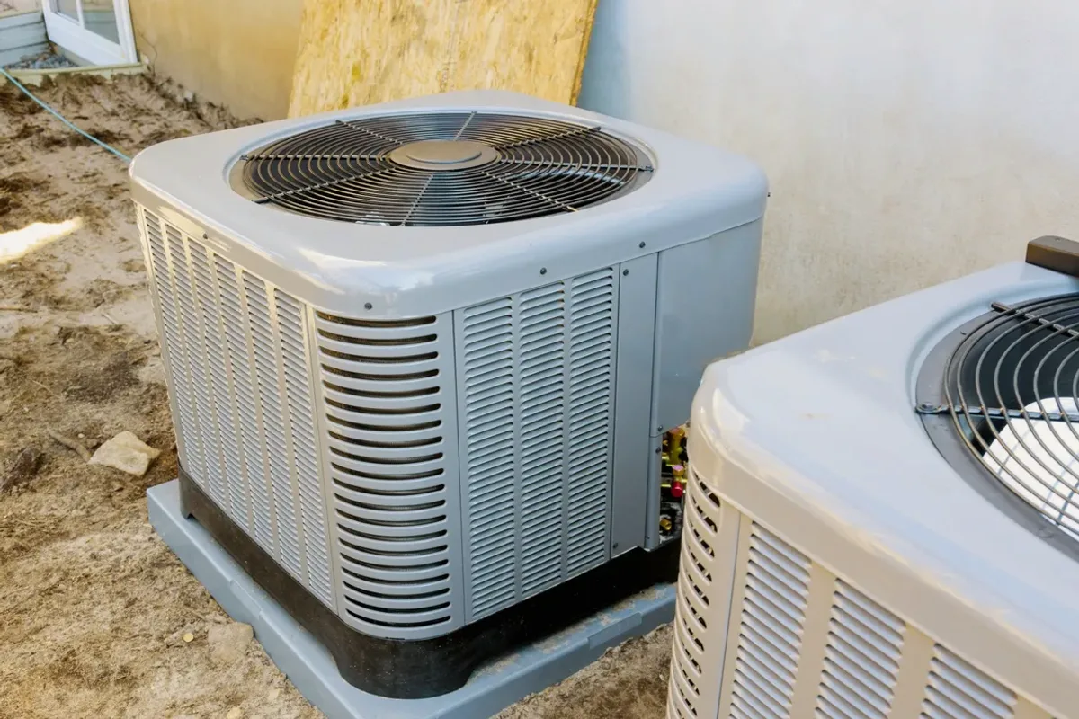Two outdoor air conditioner condensers